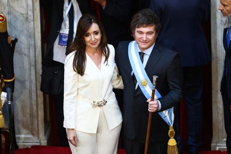 Argentina's new Vice President Victoria Villarruel and Argentina's President Javier Milei embrace during their swearing-in ceremony at the National Congress, in Buenos Aires, Argentina December 10, 2023. REUTERS/Matias Baglietto